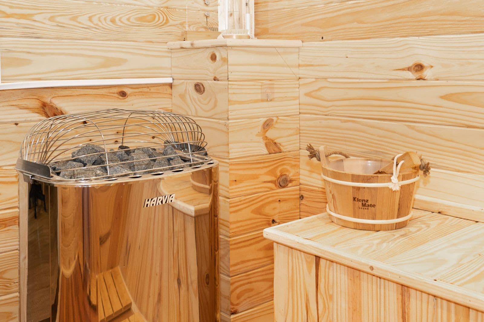 The pine sauna at the Chub Cay spa, with its heater and bucket